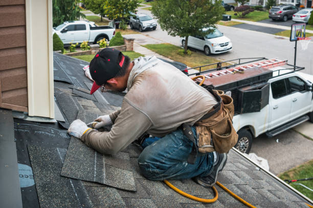 Professional Emergency Roof Repair technician working in Arcadia, MI